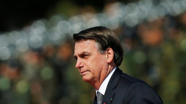 Bolsonaro va al mercado para insistir en que ‘Brasil no puede parar’